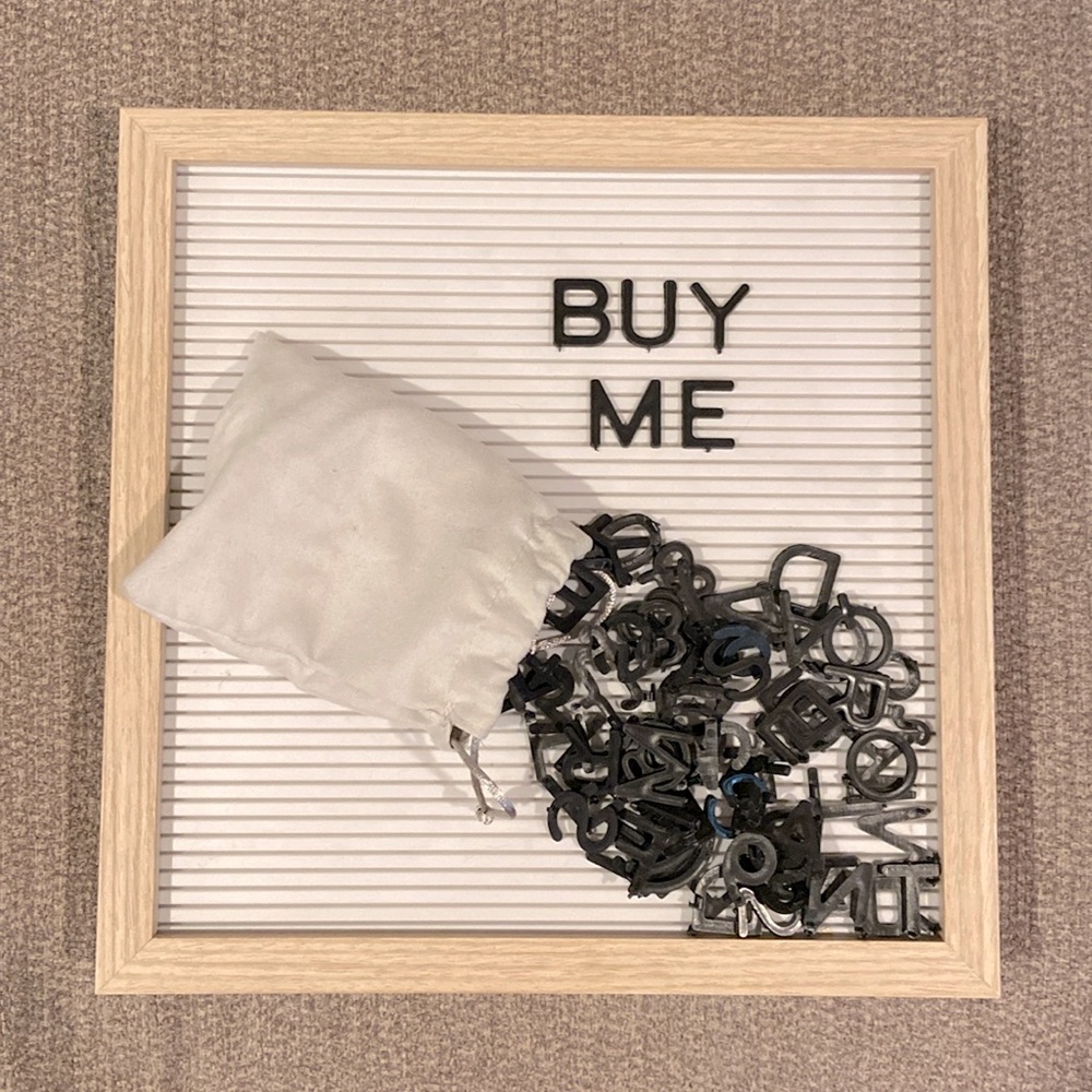 New letterboard with bag of letters